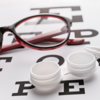 Eye chart with glasses and contacts